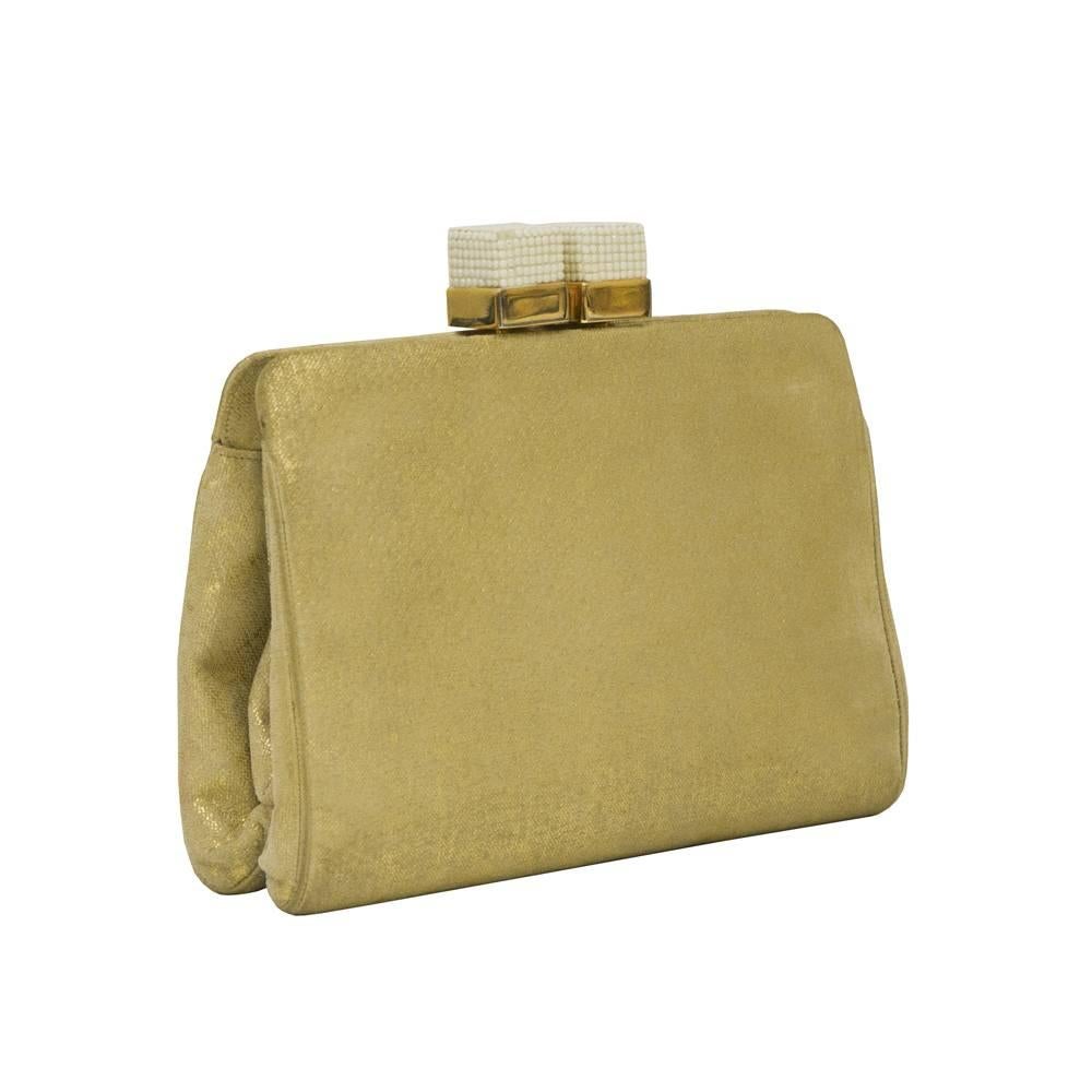 Elegant 1970's Judith Leiber gold stencilled beige suede clutch with opaque white marcasite covered cube kisslock clasp. The bag is composed of supple suede on a hinged goldtone frame. Hide away gold chain strap, nude satin interior with an