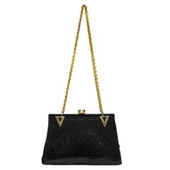 1960's Black Stamped Skin Shoulder Bag with Gold Details