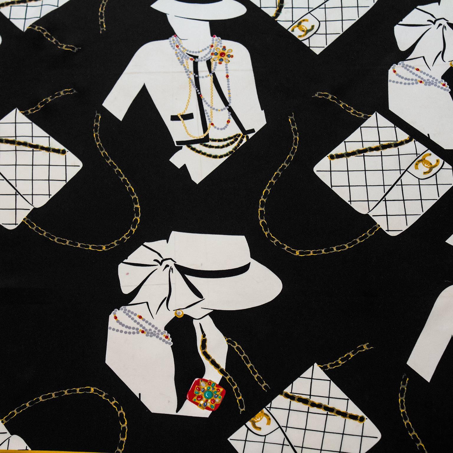 Elegant Chanel silk scarf dating from the 1980s. Black with accents of gold and red and graphic of Coco Chanel with the 2.55 quilted Chanel bag. Both iconic images for the brand. In excellent vintage condition. 

33