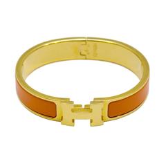 2007 Hermes Gold and Orange Clic Clac H Bracelet 