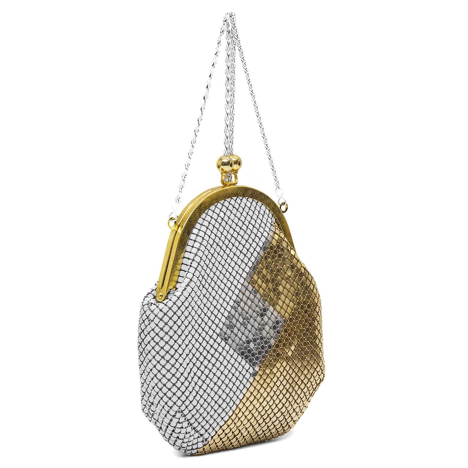 Stunning anonymous 1960's metal mesh evening bag in the style of Whiting and Davis and Paco Rabanne. White, gold and silver geometric pattern, with gold plated hardware, kiss lock and white on metal long chain. Clean fabric interior. Excellent