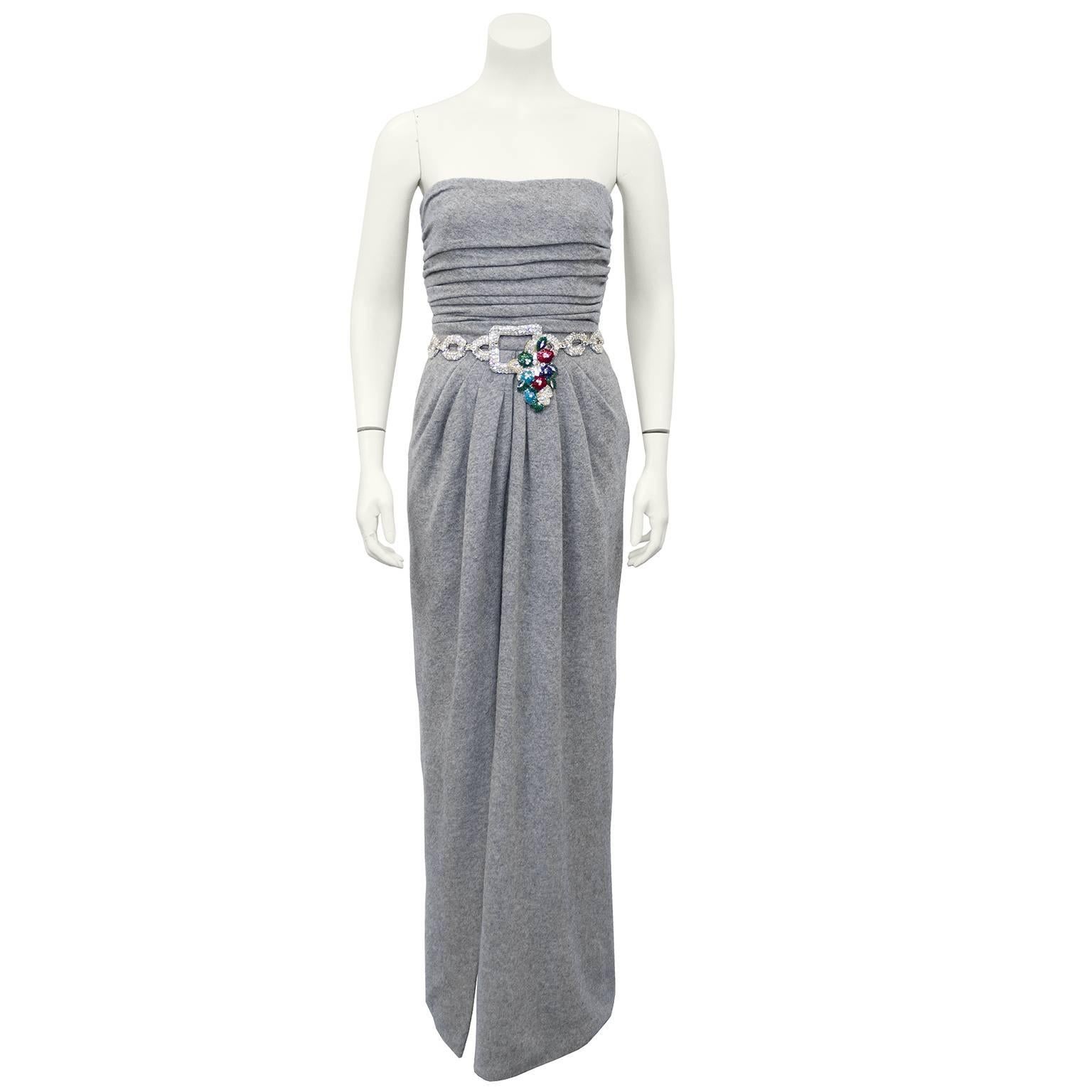1980's Carolyne Roehm grey cashmere gown and cardigan ensemble. Stunning strapless dress with ruching at bodice and slight leg slit. Beautiful embellishment mimicking a belt from tiny silver sequins and beads. Matching cardigan to be worn on top.