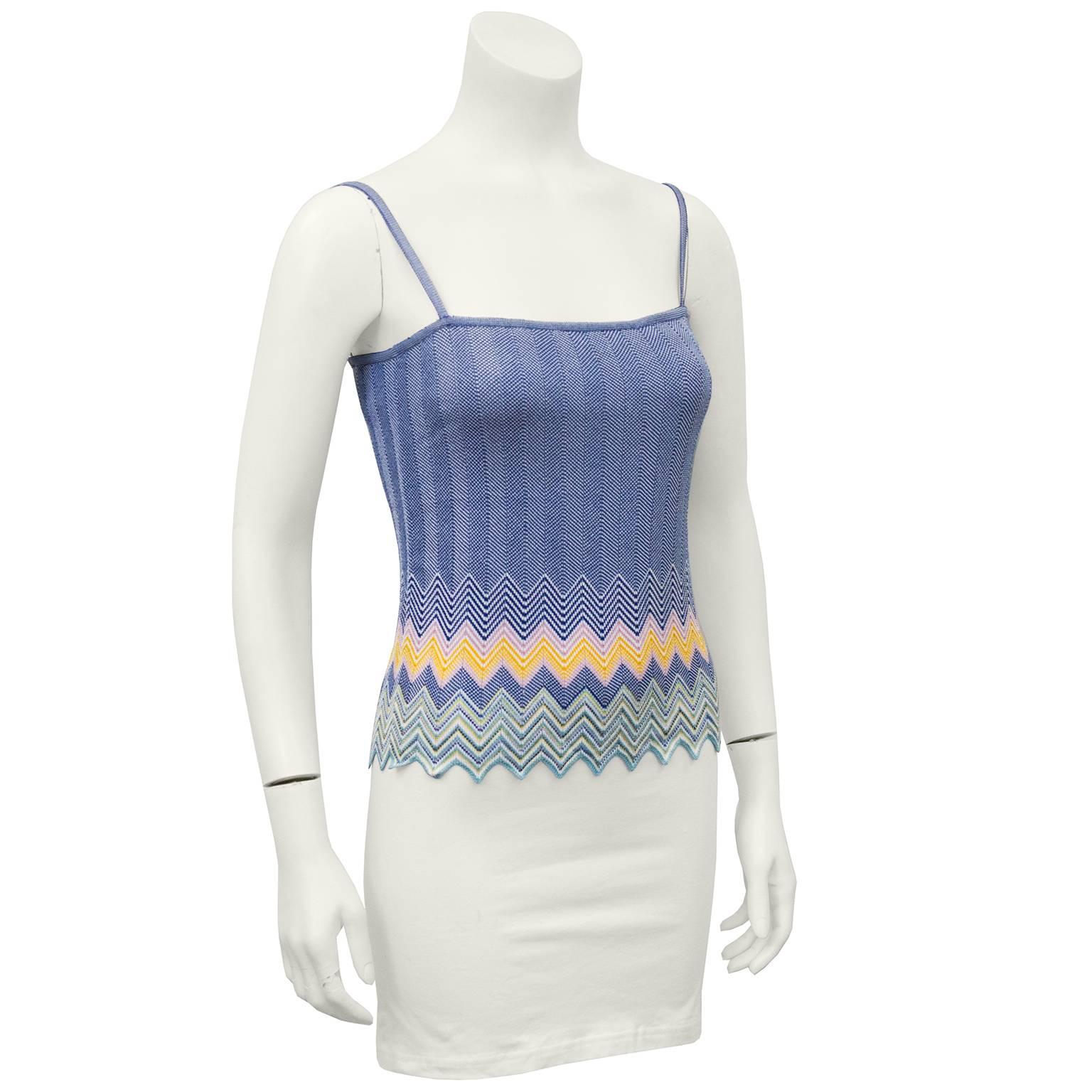 Slinky and sexy Missoni tank top from the 2000's. Periwinkle blue knit with pink, white, yellow and green chevron detailing at bottom. Perfect for vacation. Iconic Missoni fabric. Excellent vintage condition. Fits like a US 0-2/IT 40. 

Bust 28”