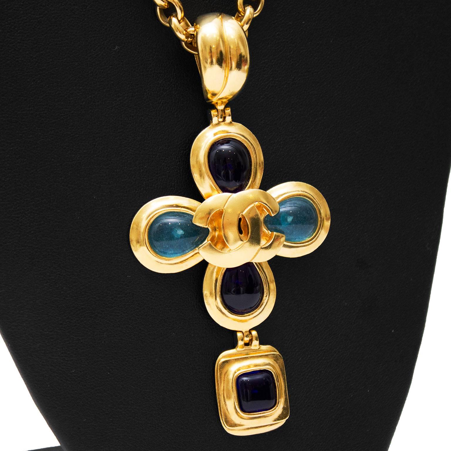 Stunning Chanel necklace from the Autumn 1997 collection. Gold tone chain with large flower pendant with shades of blue poured glass. Hook closure with 2 CC logos on either side. In perfect condition. Comes with Chanel box. 

Length 15” 
Pendent 4”