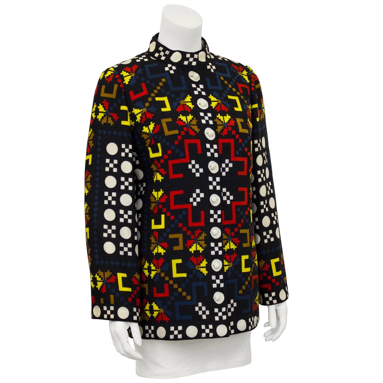 Charming and stylish light weight wool Lanvin jacket from the 1980's, featuring a bold primary color graphic print. White buttons down front avoid disrupting the print. Very slight bell sleeve Lightly lined on the interior with channel quilted rayon