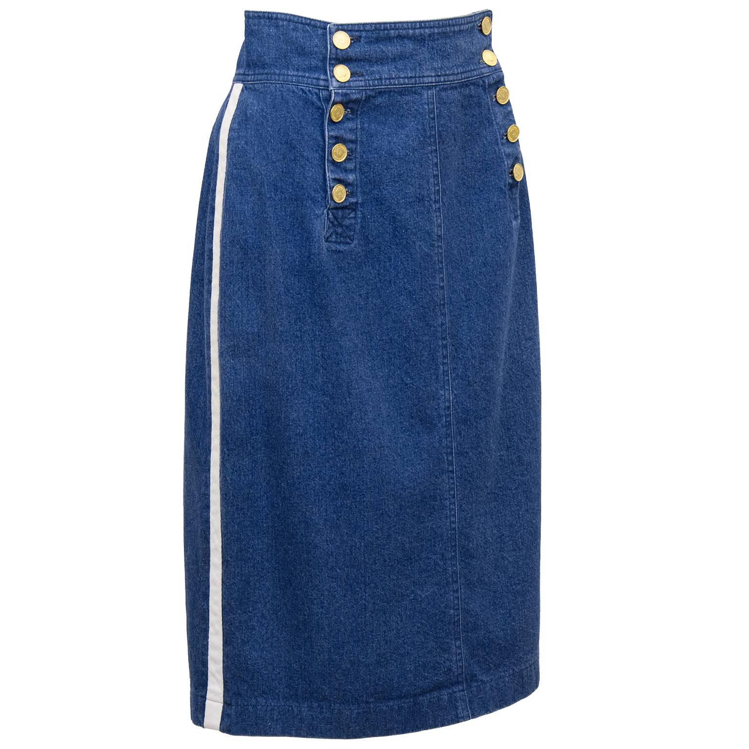 1990s Chanel high waisted sailor denim skirt. Excellent piece, featuring stunning gold buttons with a side portrait of Coco Chanel. White trim on side seams. Excellent vintage condition, fits like a US 4/6. 

Waist 31" Hips 38" Length