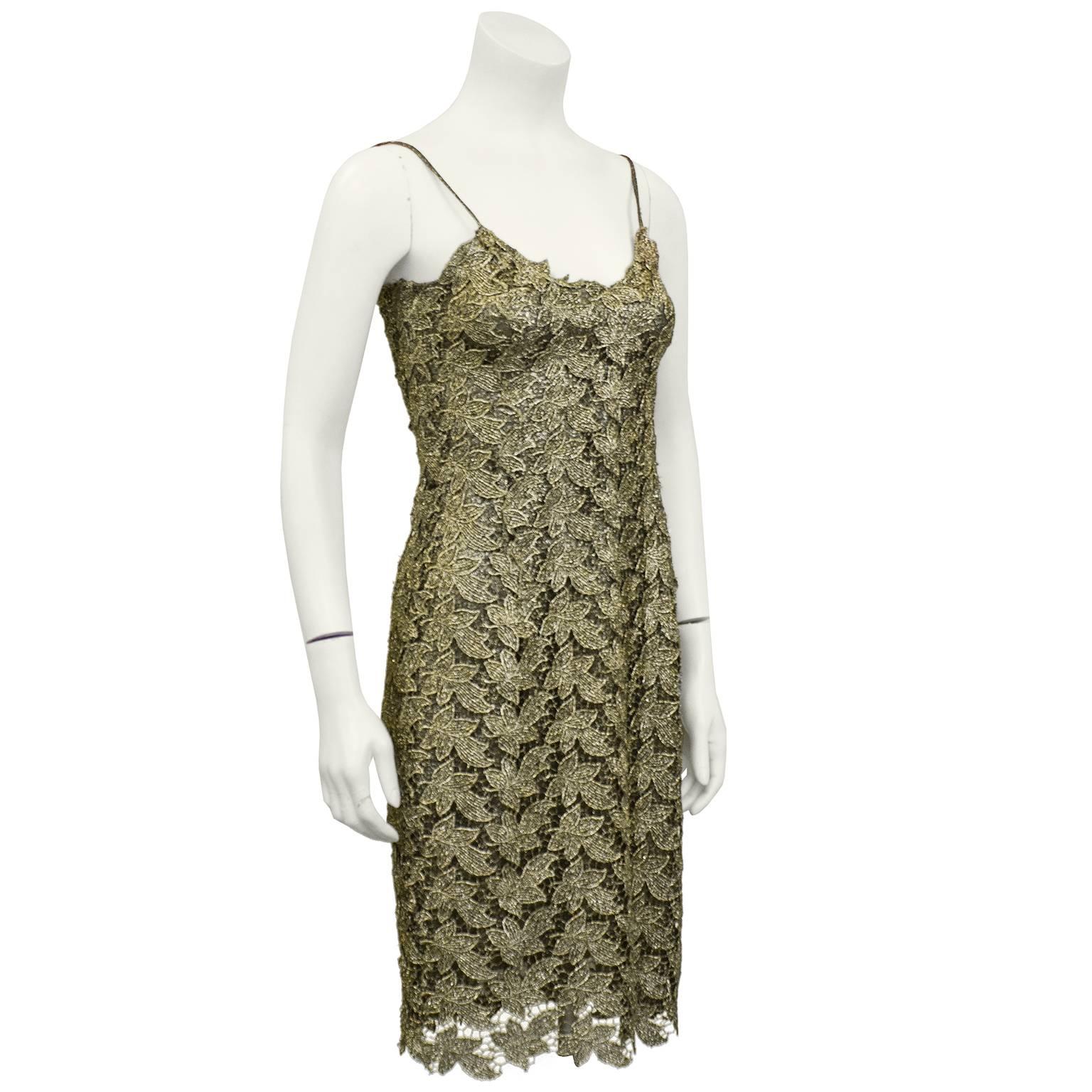 Amazing 1980s Gianni Versace gold lurex leaf motif lace slip dress with black underlay. Spaghetti straps and slight v neck. Zipper closure at centre back. Gold lurex hits the light beautifully. IT 42, fits like a US 4. Excellent vintage