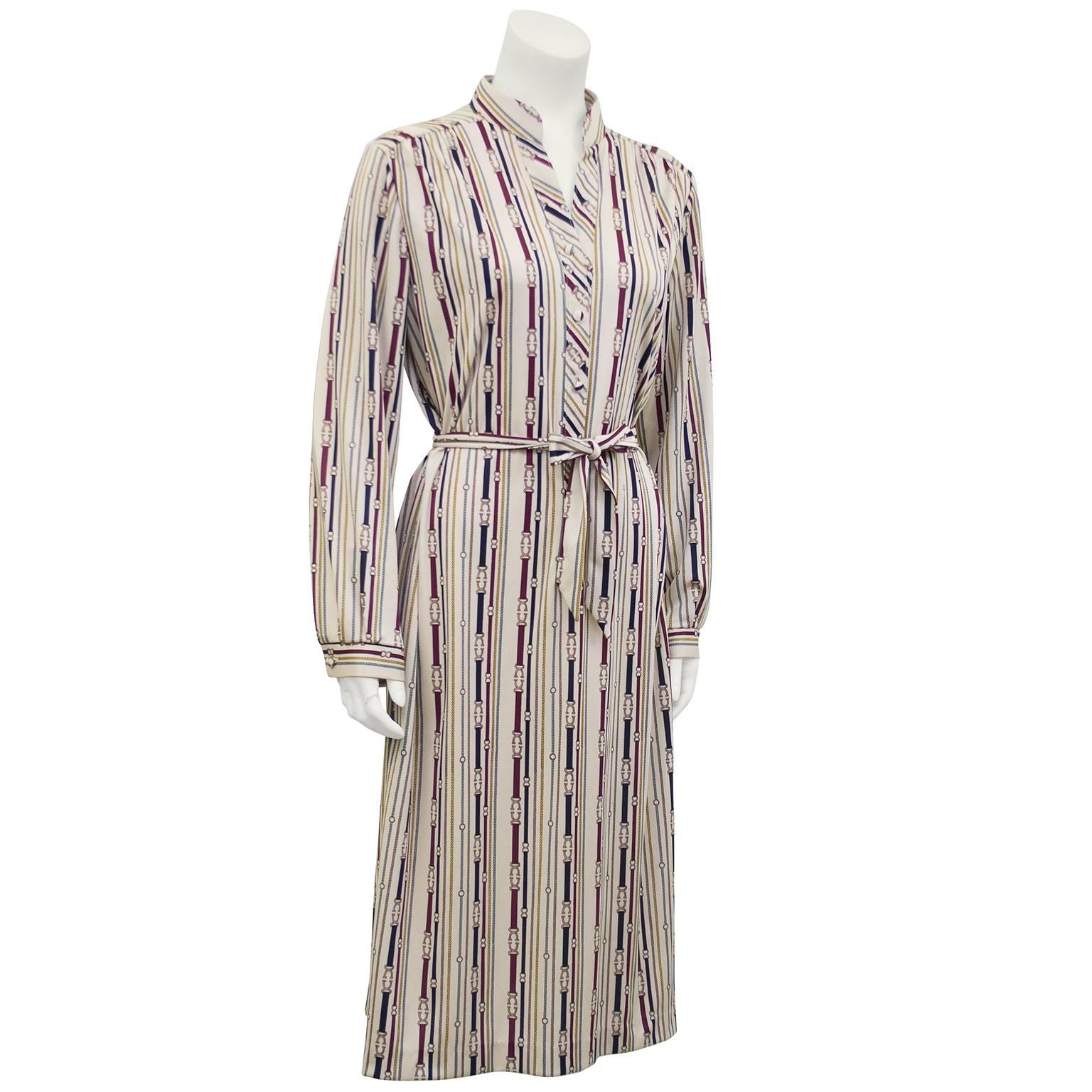 Great 1970s Lanvin polyester long sleeve dress. Nautically printed with vertical multi colour ropes and buckles. Henley collar with a matching fabric belt that can be styled to your liking. Excellent vintage condition. Fits like a US 6.

Sleeve 20