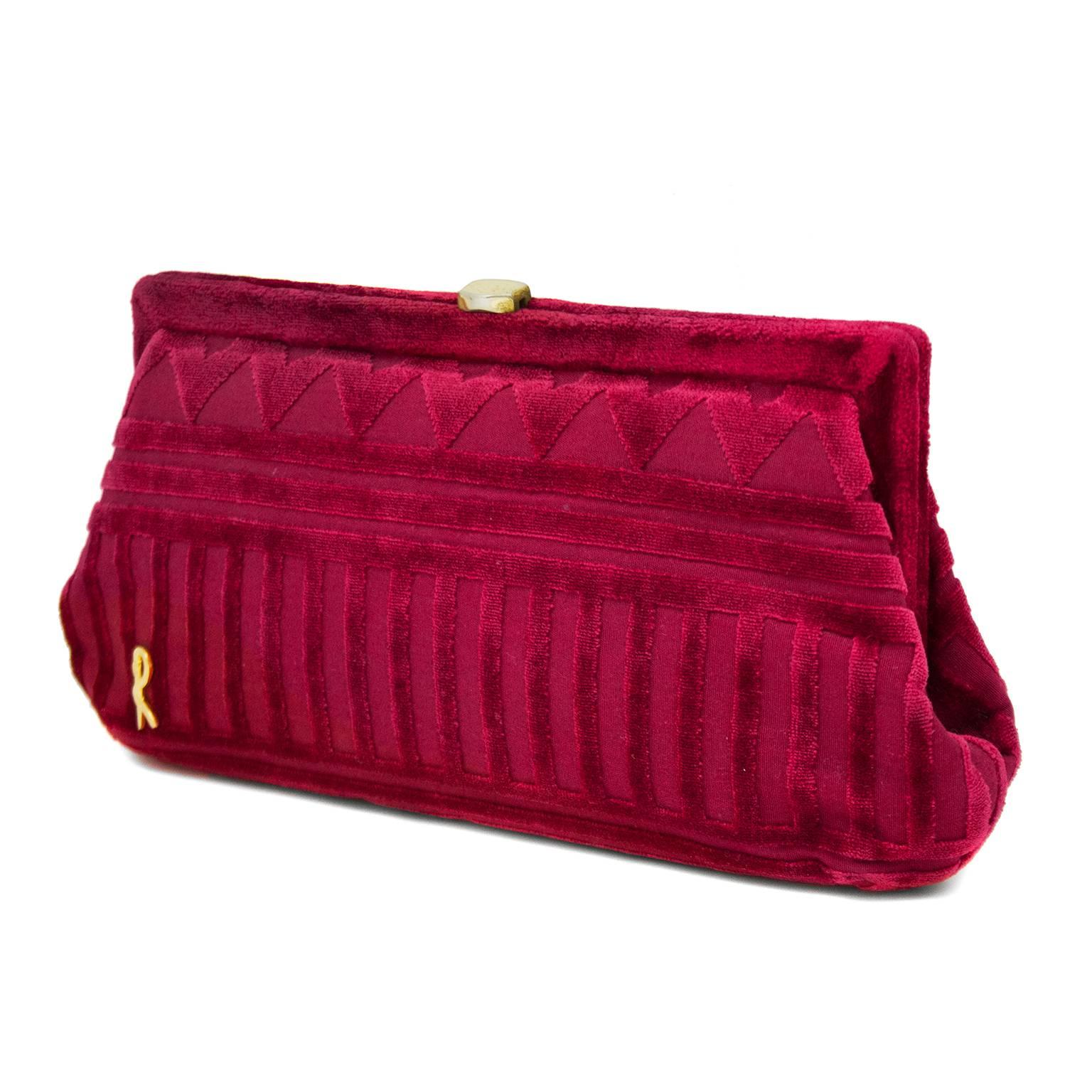 1970s Roberta Di Camerino double top handle bag. Beautiful deep raspberry colour with cut velvet patterns throughout and gold hardware. Long 14" removable velvet strap and a short gold tone metal handle. Gold handle flips down and can be hidden