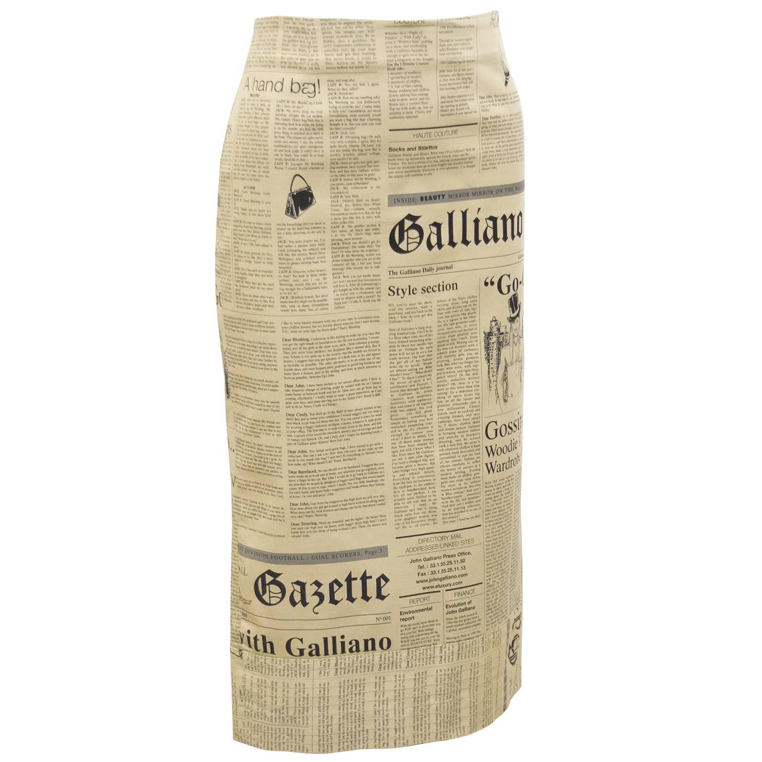 John Galliano pencil skirt in his iconic newsprint fabric, from 2000. The print is best known from the Carrie Bradshaw newsprint dress in season 3 of the HBO show Sex and the City, and reappeared in the second Sex and the City movie. Perfect,