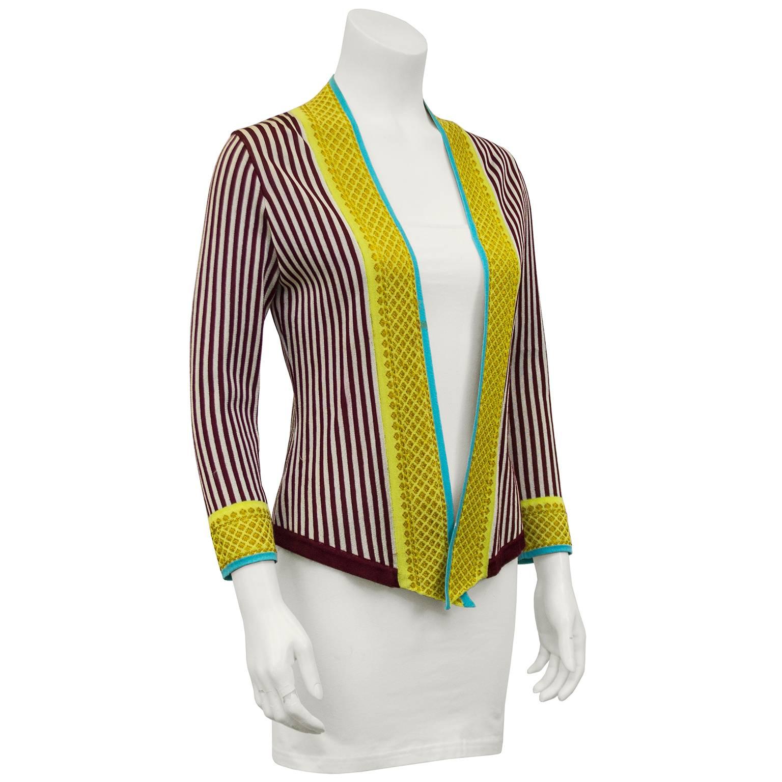 Early 2000s Jean Paul Gaultier redish brown and white vertical stripe cardigan with a thick yellow and turquoise trim. No buttons, lays open. Perfect with jeans. Very good vintage condition, small stain on yellow trim (see photographs). Fits like a