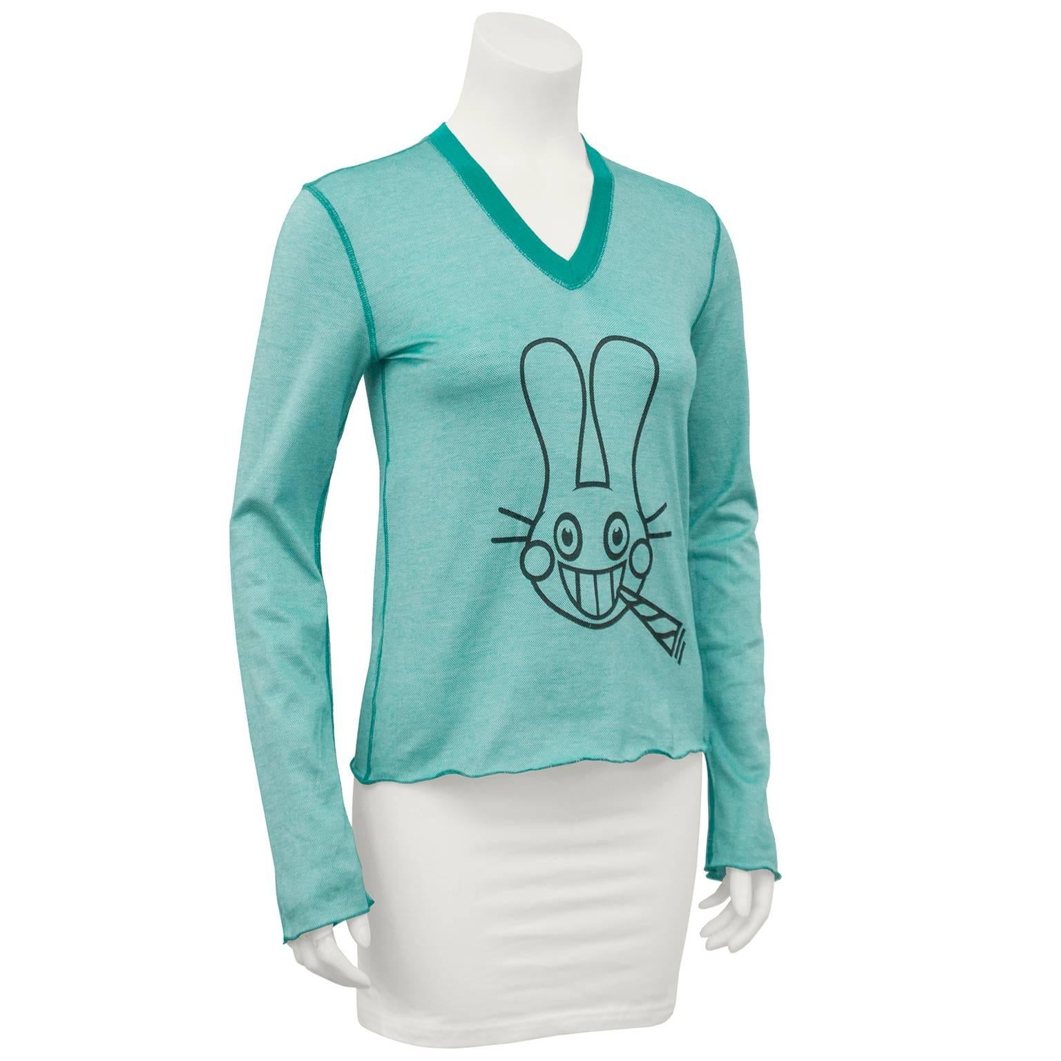 Long sleeve, v neck, teal cotton shirt from the spring/summer 2003 Lucien Pellat-Finet collection with teal top stitching. Large black cartoon bunny graphic printed in middle. Excellent vintage condition. Size small. 

Sleeve 23