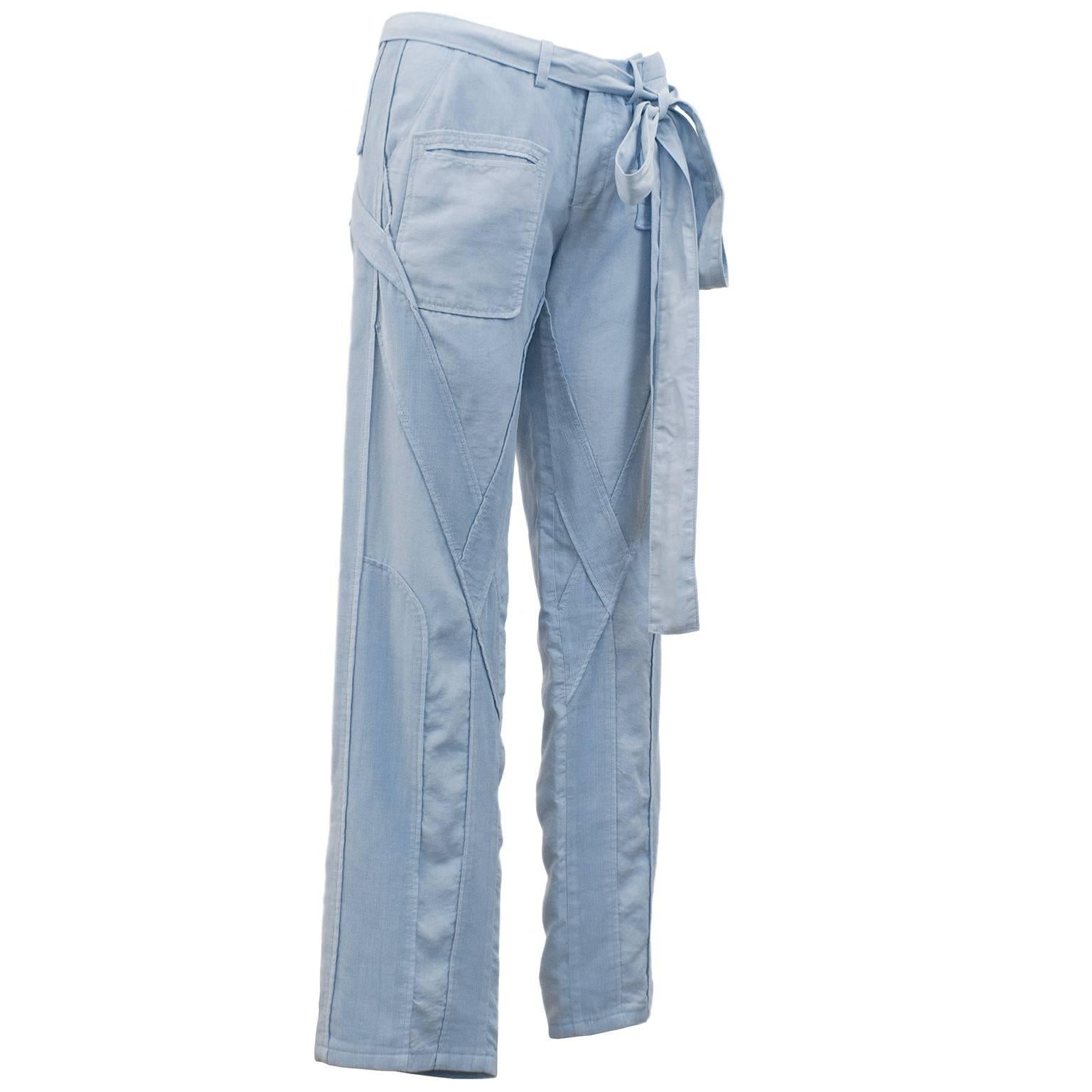 Iconic Balenciaga by Nicolas Ghesquière cargo pants from the spring 2002 runway collection featuring sky blue cotton fabric with corduroy detailing along pant leg, sash tie at waist and button closure. Collectors piece from Ghesquière's early years