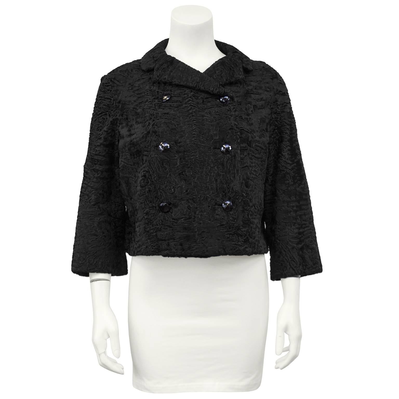 Christian Dior Original for Holt Renfrew label black broadtail cropped jacket is amazing and in immaculate condition. The adorable jacket does up the front, double breasted style, with black faceted plastic buttons. Lined in black silk and
