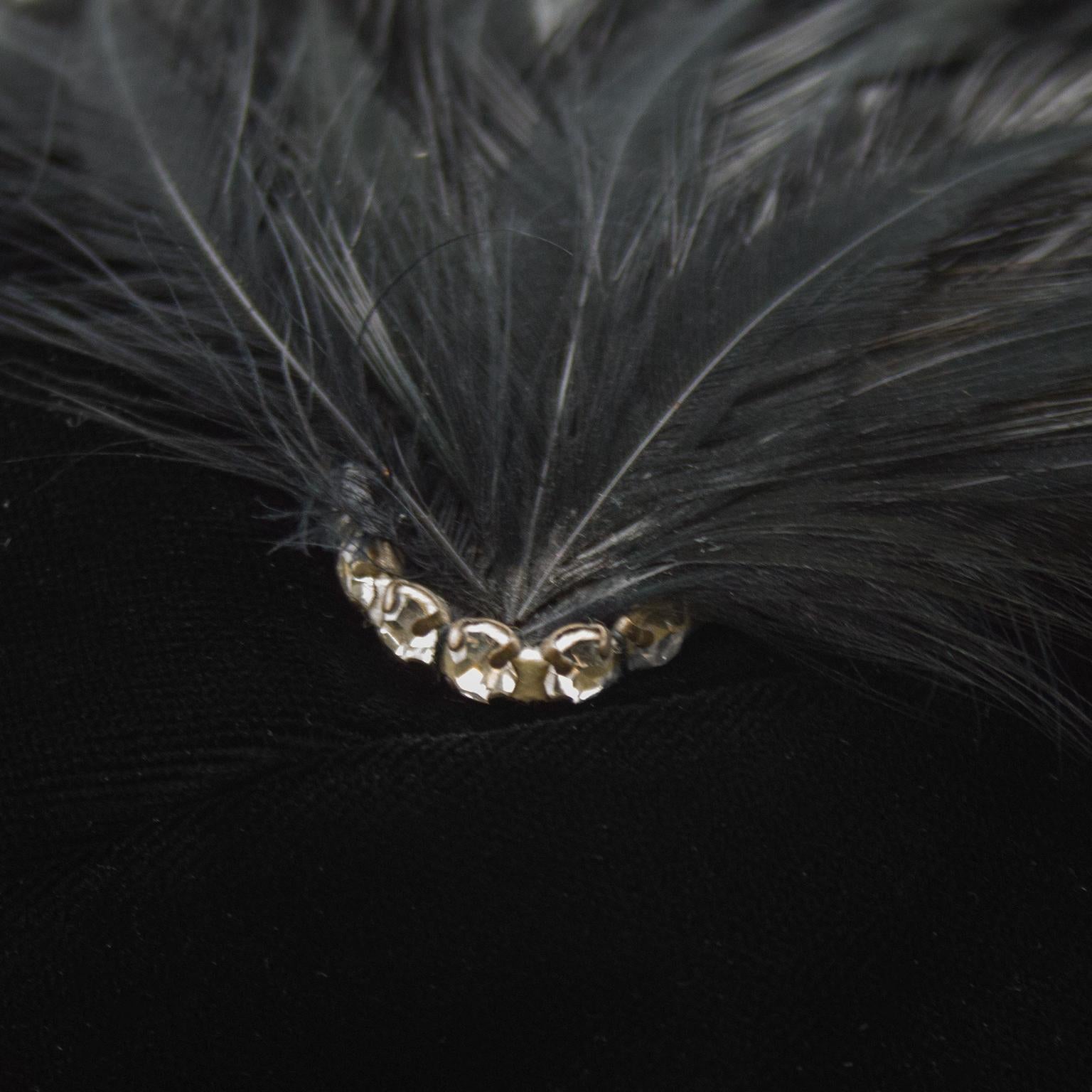 1950's Saks 5th Avenue Black Cloche Hat With Feather In Excellent Condition In Toronto, Ontario