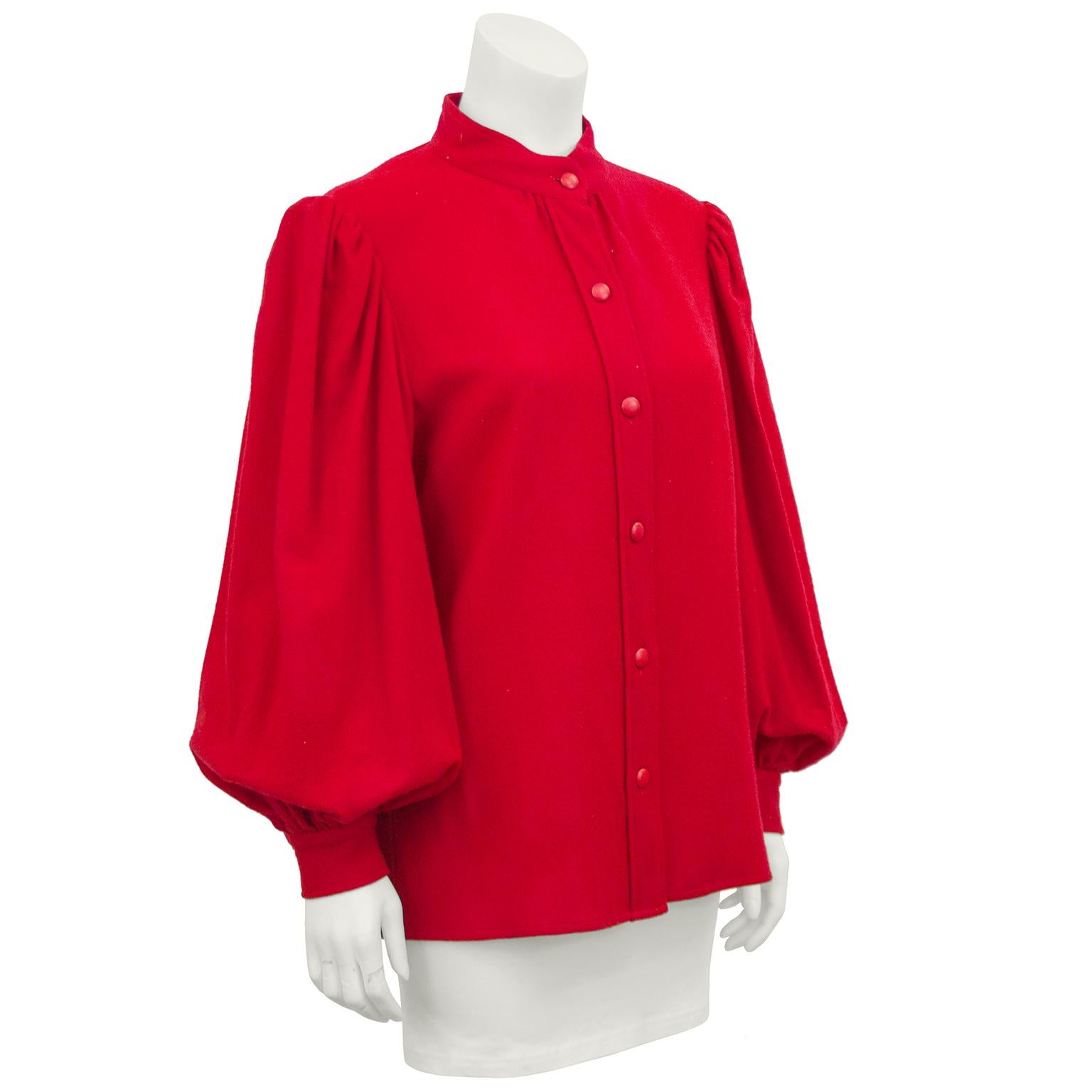 1960s YSL Rive Gauche label red wool balloon sleeve shirt. Mandarin style collar has a slight imperfection. Red plastic buttons down the front and on the cuffs. In very good vintage condition. Fits like a US 6-8.