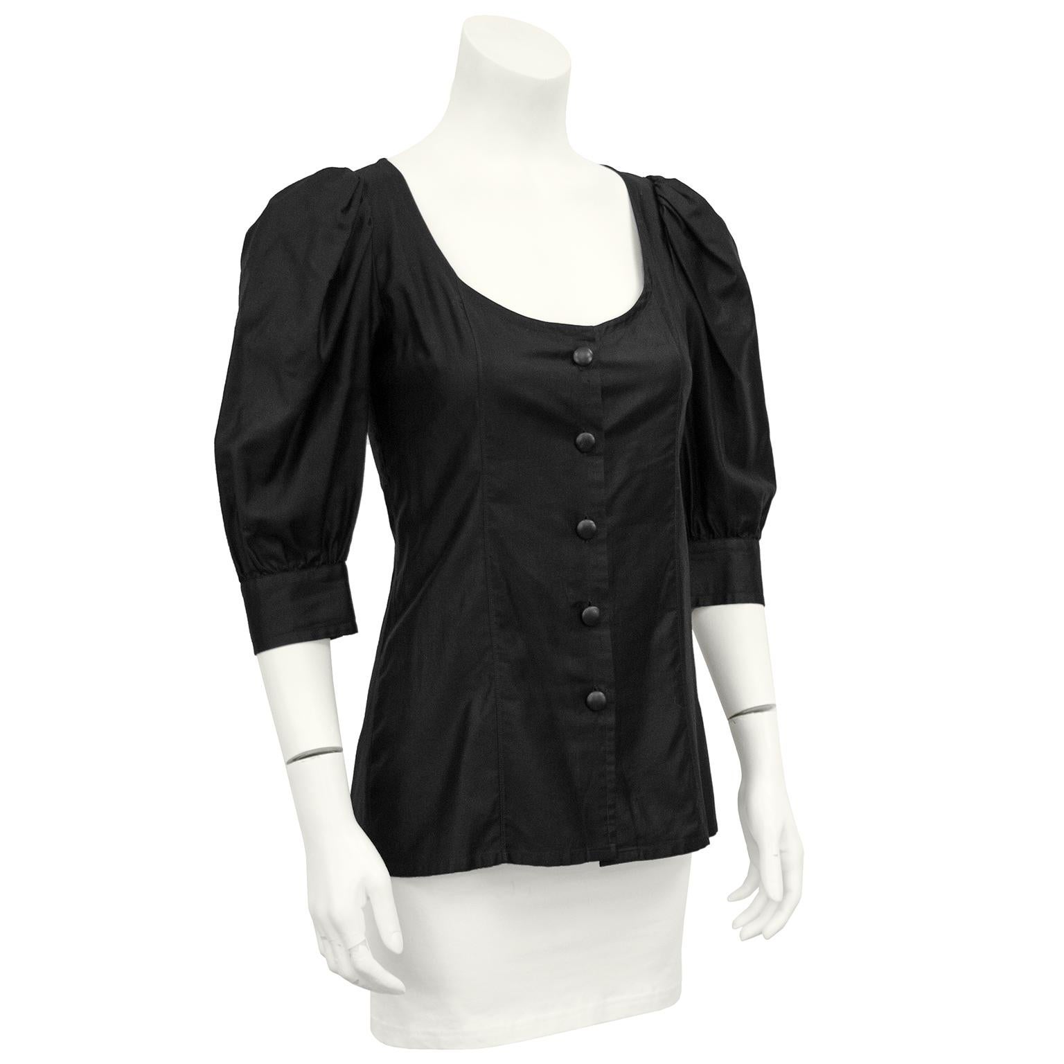 1980's YSL/Saint Laurent black polished cotton peasant style blouse with scoop neckline, and 3/4 length pouf sleeve with cuff. Fitted through the body with a slight flare at the waist, two seams up the front. In excellent condition, dry cleaned and