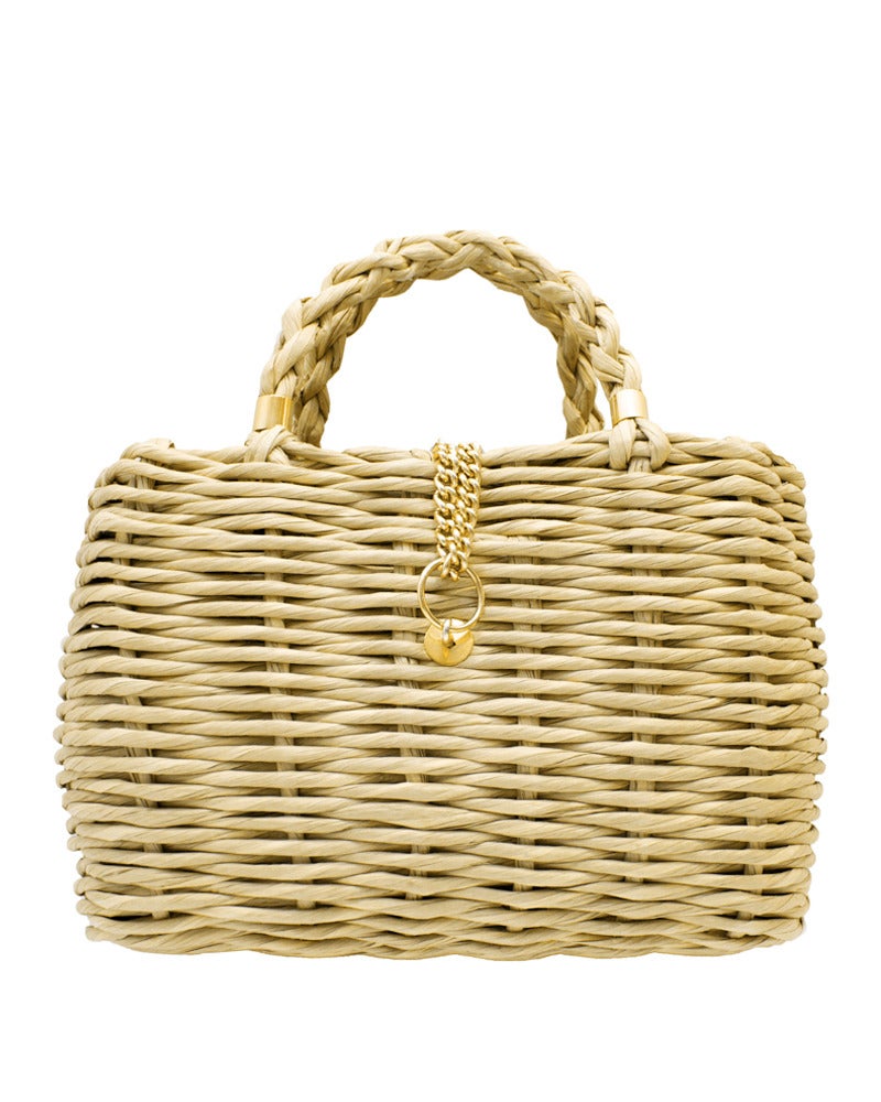 1976 Roberta Di Camerino weaved raffia handbag with braided handles and gold detailing. Gold Roberta Di Camerino markings on bottom left corner of bag and stamped leather on inside of bag. Lined in beige canvas. Two gold link chains fasten in a