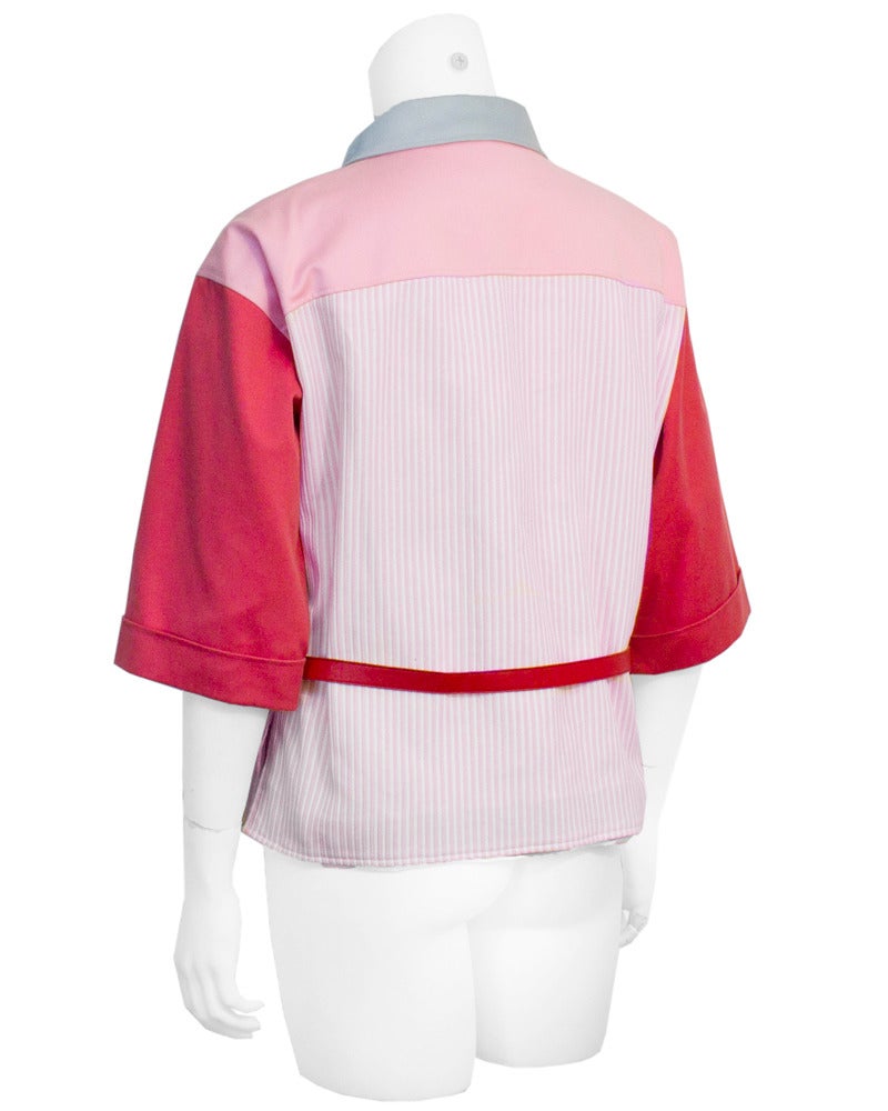 Courreges cotton color block jacket. Red belt at waist classic snap style front with zipper detail on the lower pockets. Size a fits like a US 2-4. Excellent condition.