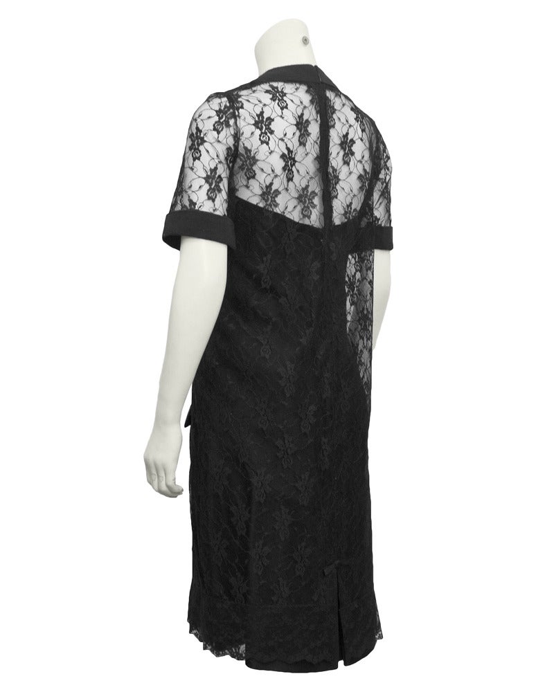 Exquisitely simple Harvey Berin by Karen Stark lace dress with satin underdress from the early 60s. The collar and pockets on the front of the dress are finished with ribbed satin and black buttons accents. The four patch pockets are a reference to