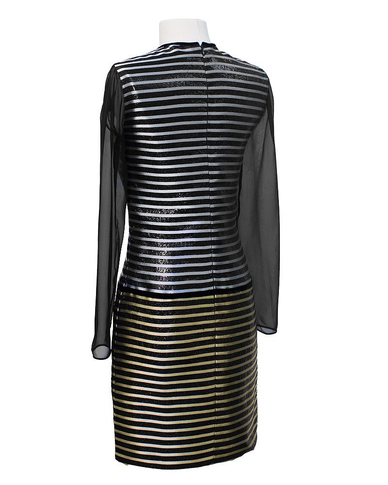 The sleek, elegant, minimal look of this 1980's haute couture Galanos cocktail dress is hard to deny. Finding a dress that is perfect for evening is a challenge. Silver, gold and black with a simple waist fitted silhouette, enhanced with a touch of