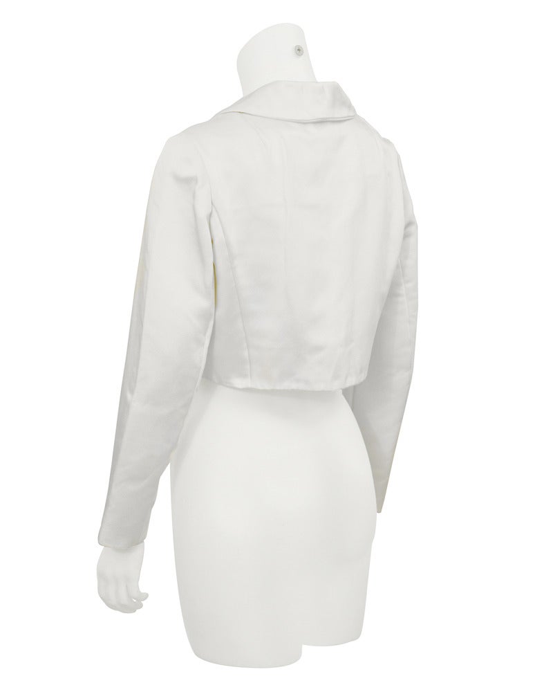Excellent vintage near mint condition 1960's Victoria Royal off white satin cropped evening/day jacket with jeweled buttons. Fits like a mini denim jacket, with enough style to wear for day with jeans or over an evening dress.