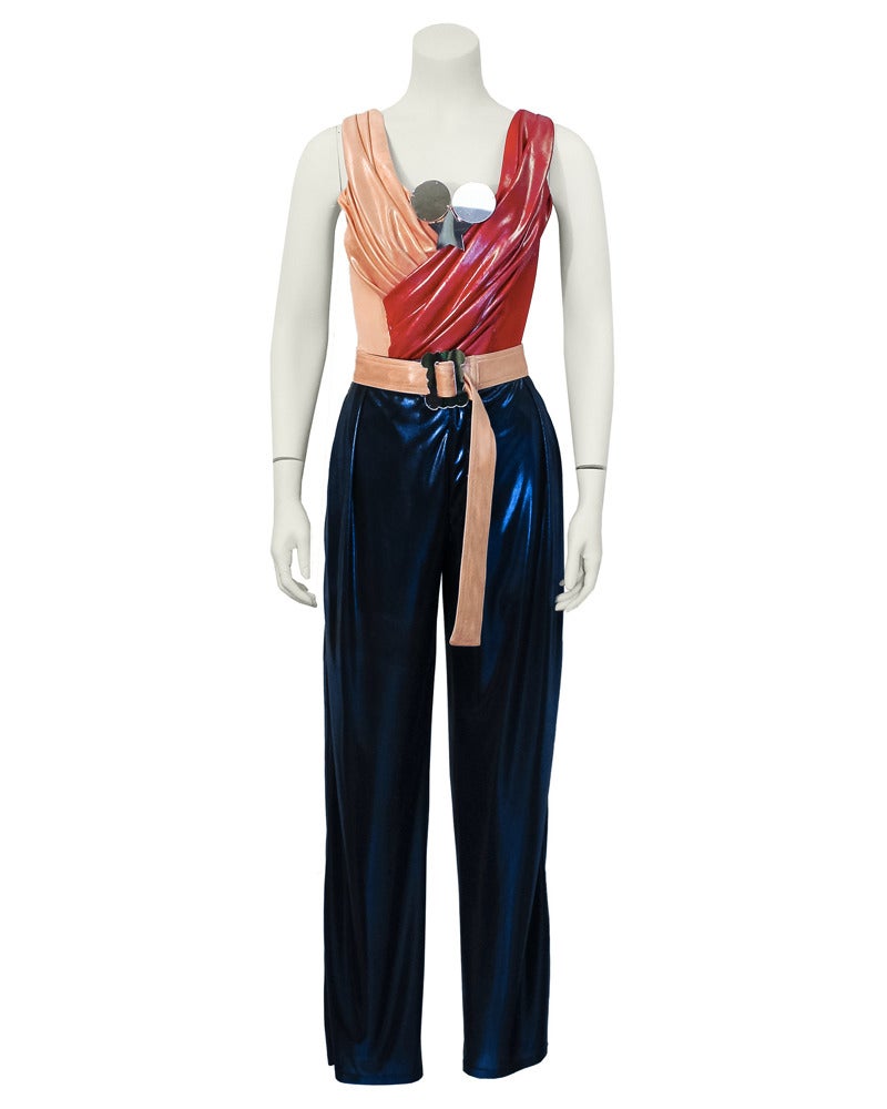 Eccentric late 1980's Vivienne Westwood wonder woman bodysuit and pant ensemble. This outfit was purchased at a Christies South Kensington  from Vivienne Westwood archives and is highly collectable. Bodysuit has salmon pink and red panels that are