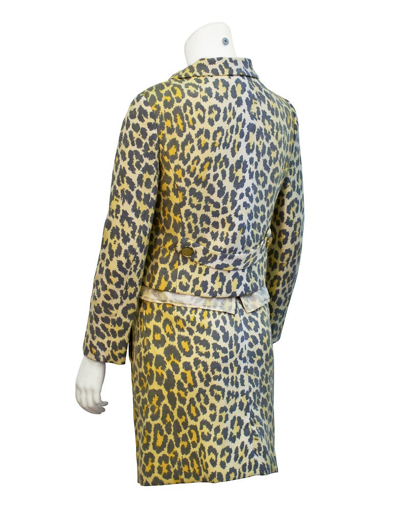 Lady-like 3 piece washed look leopard wool suit with matching sleeveless chiffon printed top. All three pieces work well on their own or as a chic set worn to a special occasion. 1960's American design, in excellent condition. Timeless and well
