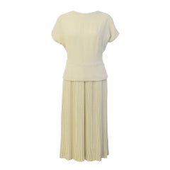 1940's Manguin Cream Dress with Pleated Skirt and Bow Detail