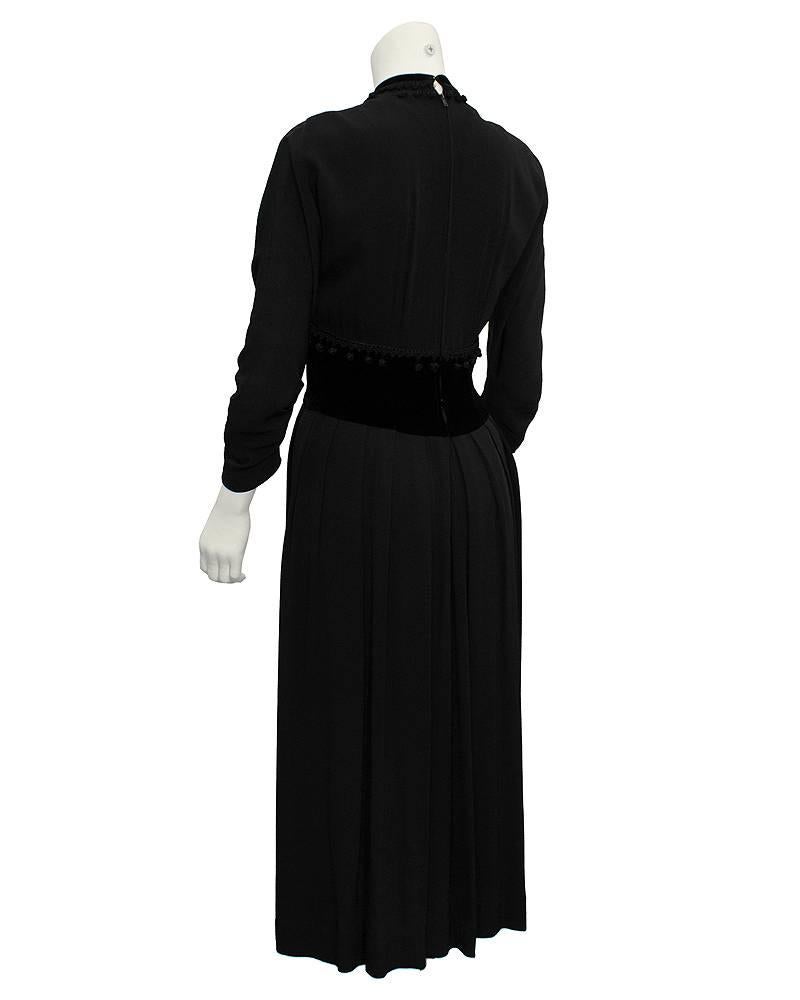 Late 1940's Hattie Carnegie Black Dress with Velvet and Pom Pom Details In Excellent Condition In Toronto, Ontario