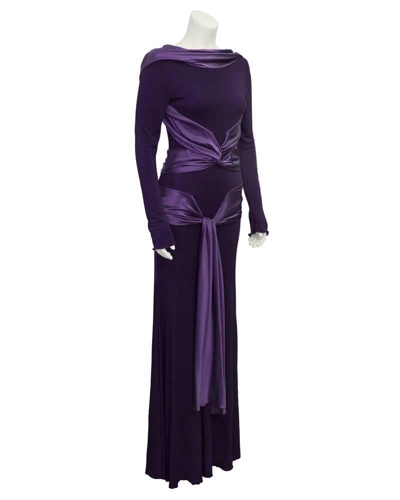 Alexander McQueen purple gown from his 2004 ready-to-wear collection. Jersey with satin banding that crosses across the the stomach and then ties at waist. Same gown as worn by Mary, Crown Princess of Denmark. Excellent condition. 