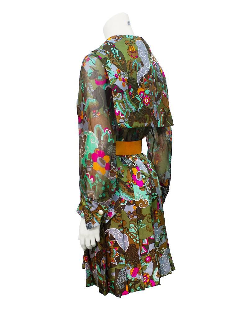 Adorable silk 1970's Pucci-esque print day dress with matching organza sleeves, faux pearl buttons, wide cinch belt and sailor collar. Mint condition! Hong Kong Dynasty Silk dress and gown company well known for its extravagant beaded and printed
