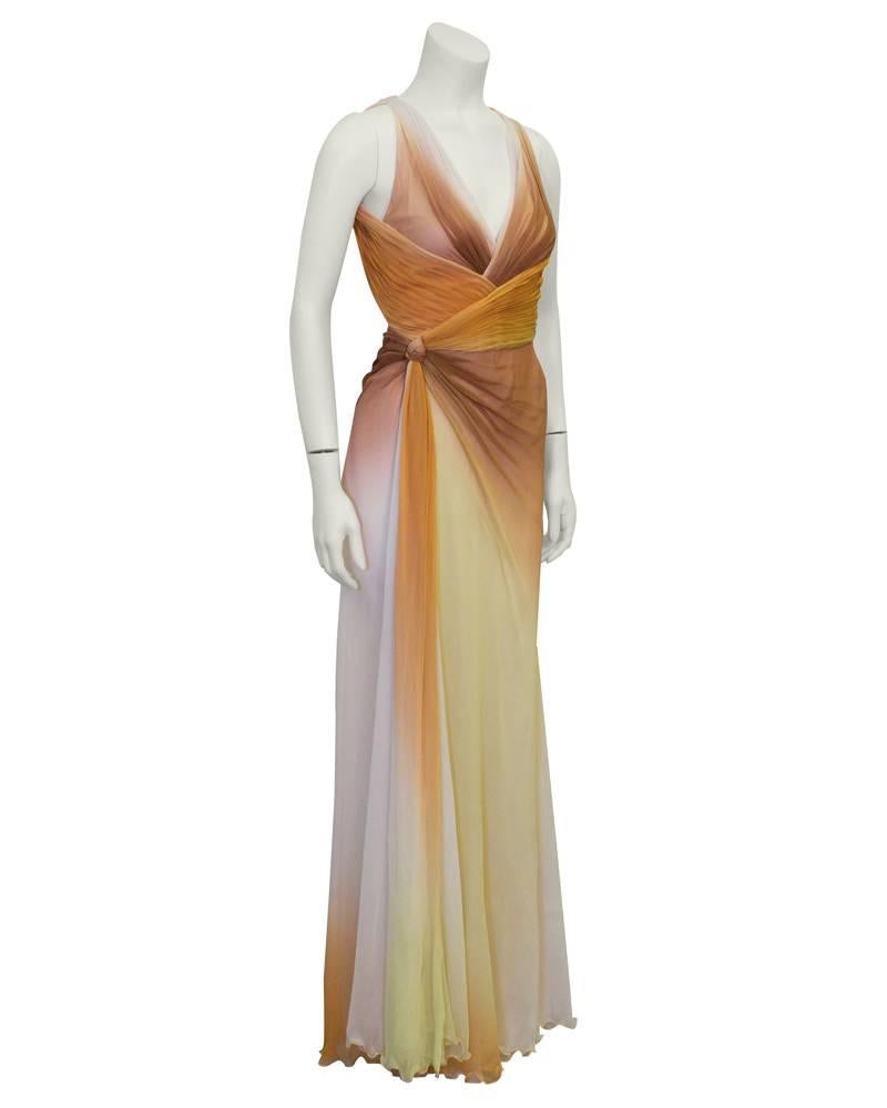 Stunningly beautiful Versace gown from the early 2000's. Layers of ombre silk chiffon with tones of tan and cream. Gathering around bust and waist. Knot detail on left side of waist when wearing. Deep v neck line, open back and halter tie at nape of