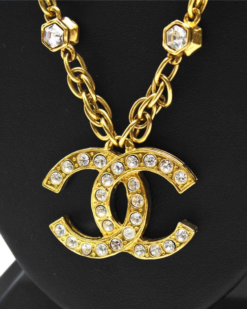 This glamorous 1980's Chanel chain necklace features rhinestones along the chain, and on both front and back of the CC pendant. Gold plated with a spring clasp. Excellent vintage condition. 