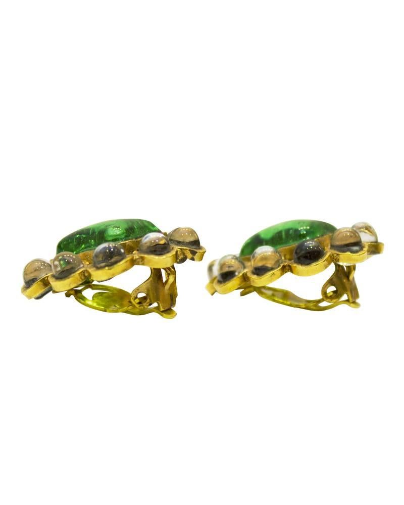 Attributed to Gripoix for Chanel Couture poured glass and gold plated clip on earrings. Unusual color combination of emerald green and pinkish clear glass. Hand wrought feeling to the workmanship. Circa 1960. Made in France. Excellent vintage