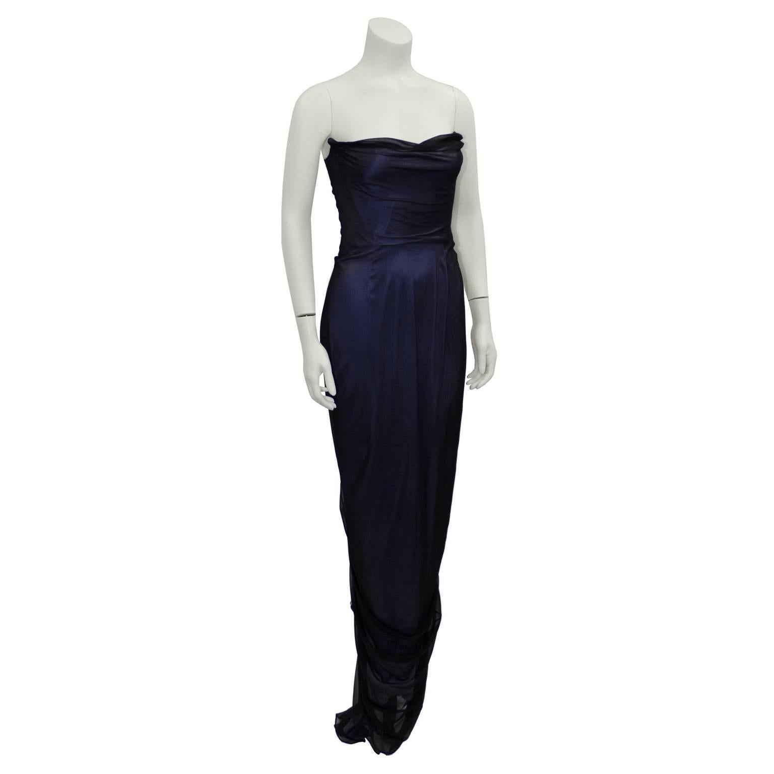 Fabulous Richard Tyler Couture slinky gown from the late1990s. A red carpet worthy piece that's strapless, with a mermaid silhouette. Purple silk is overlapped in a navy sheer net fabric. Excess fabric forms soft folds on bodice. Navy fabric is