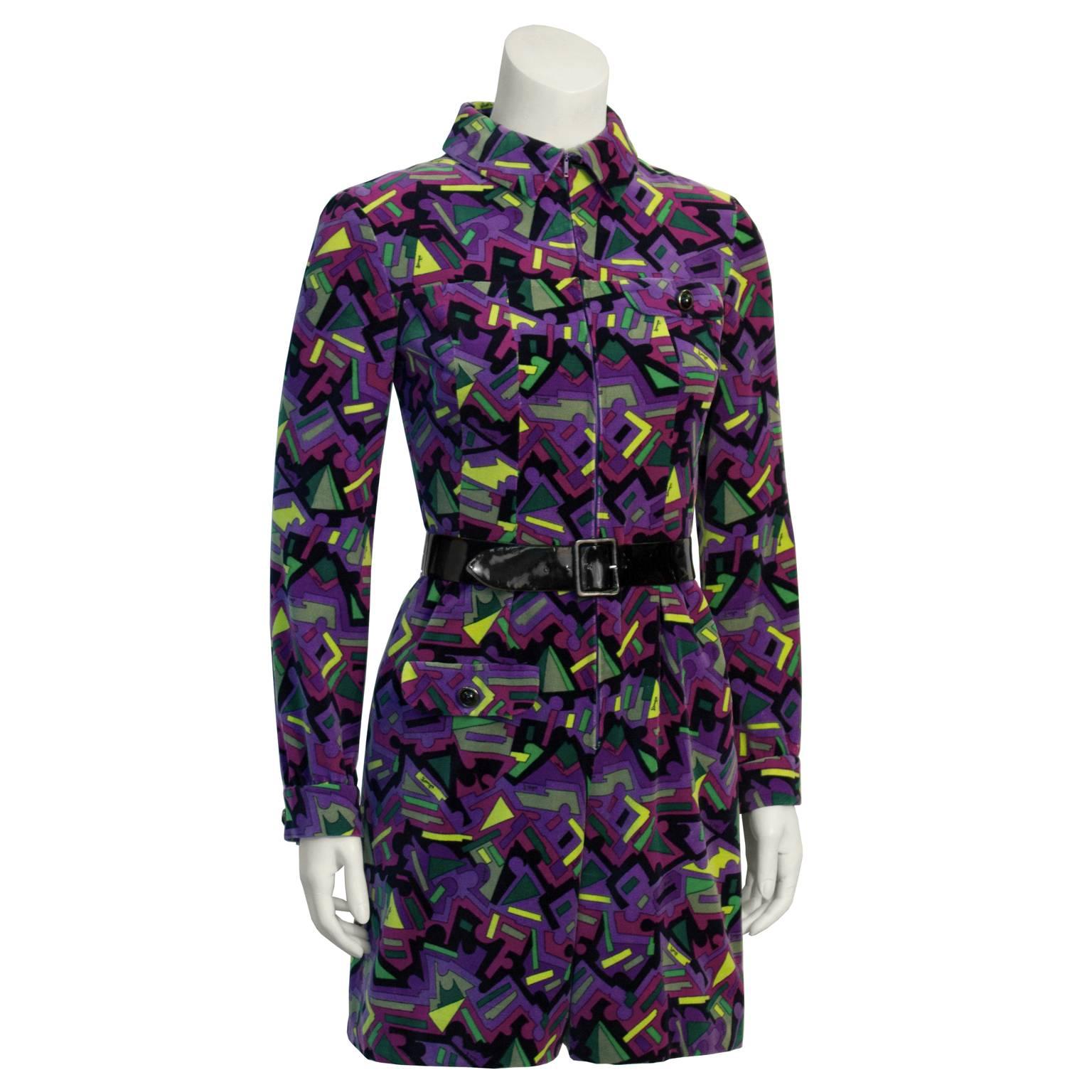 This adorable late 1960's Pucci purple velvet romper is an absolute must have collectors piece with it's signature multi-color abstract pattern throughout. The print is purple with notes of brown, green, yellow and black. Long sleeved, with a collar