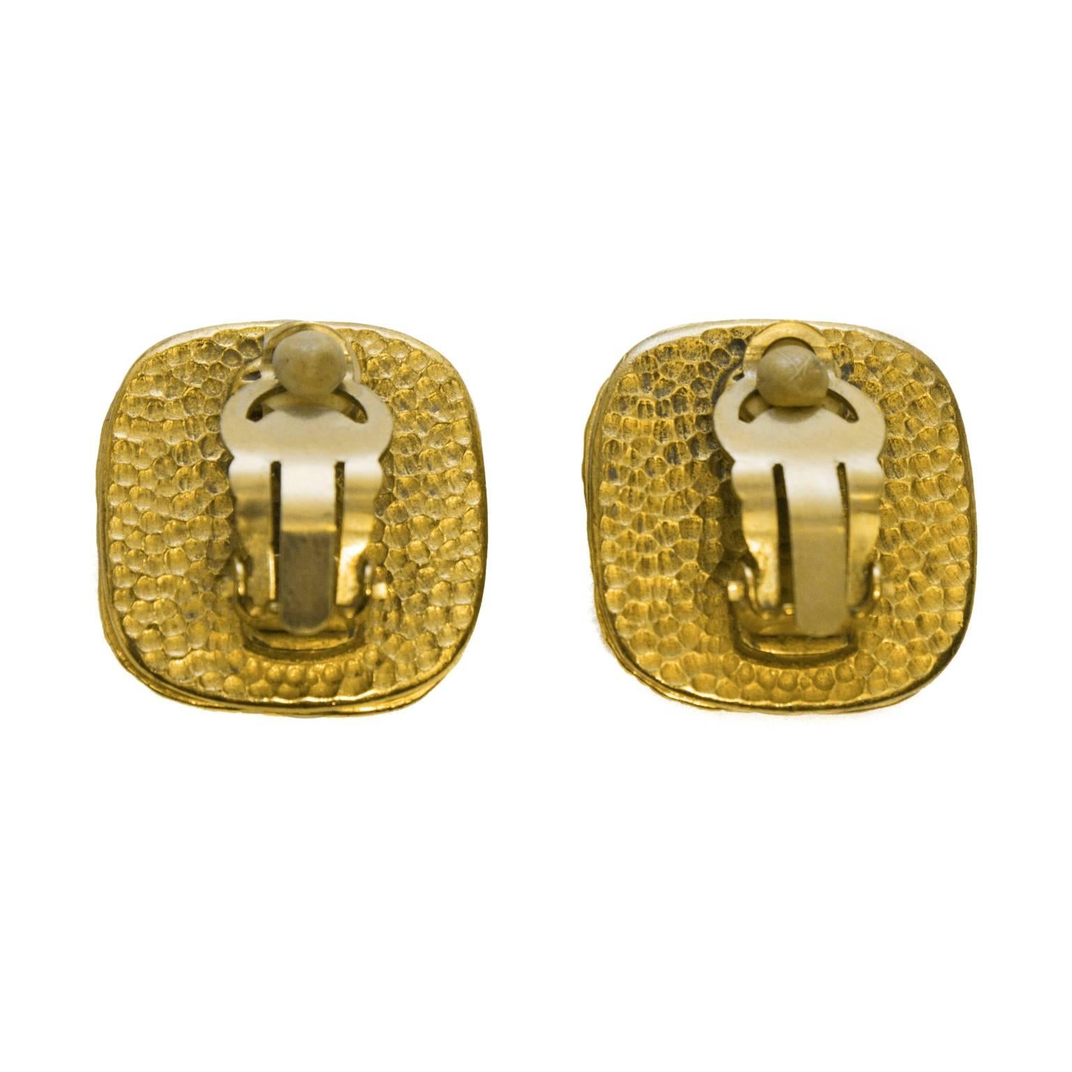 Lovely Chanel earrings from the Spring 1996 collection. Features two tiered gold plate frame with 