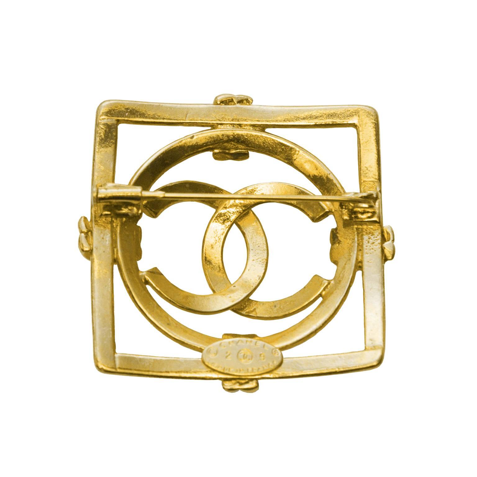 Unique geometric Chanel pin from 1992. Polished gold plate square frame, with a circular frame inside, and a CC logo in the center. Back has 'Chanel 29 Made in France' stamp, and a horizontal pin closure. Excellent vintage condition. 

