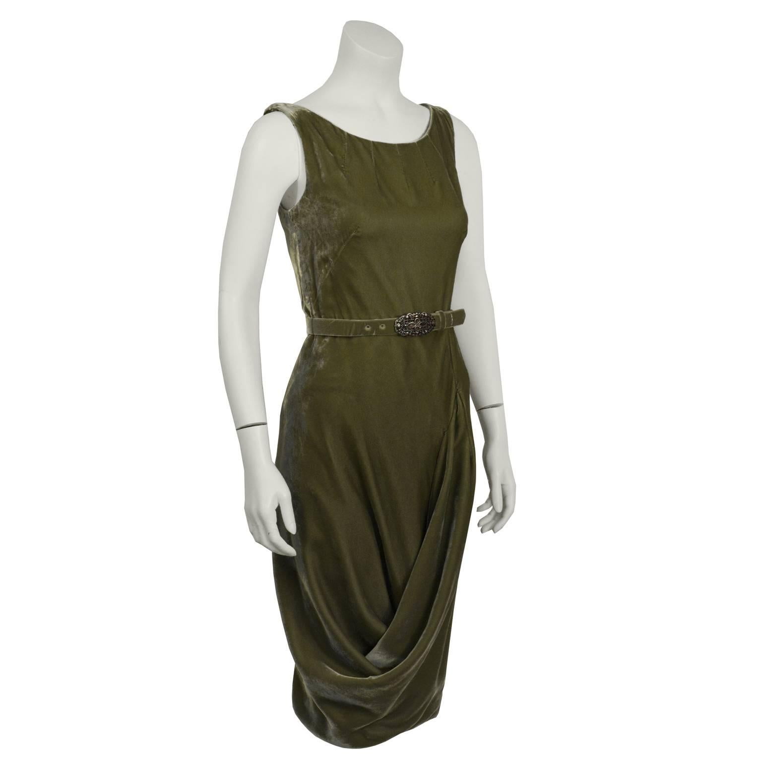 Gorgeous Alexander Mcqueen green velvet dress from the 1990s. Features a waist belt with a silver ornamented buckle and  a lovely draped skirt. Back zip closure. Excellent vintage condition. Fits like a US 6. 