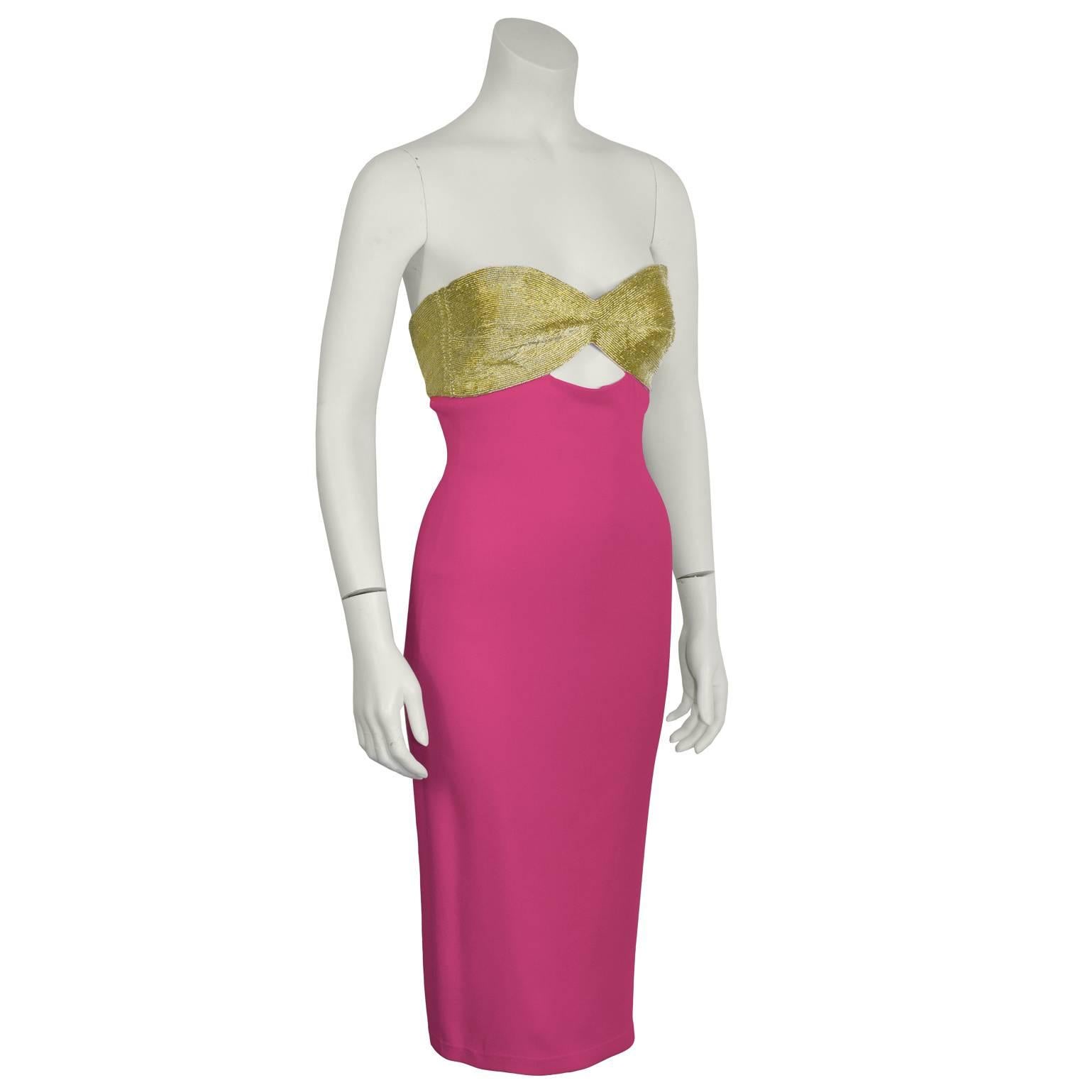 Oh la la  this is a sexy Celine hot pink strapless cocktail dress from their Spring 2004 collection. Gold corded bra-like top with a keyhole opening below the bust, finishes with a hot pink fitted silk mini dress. Hidden back zip closure. Featured