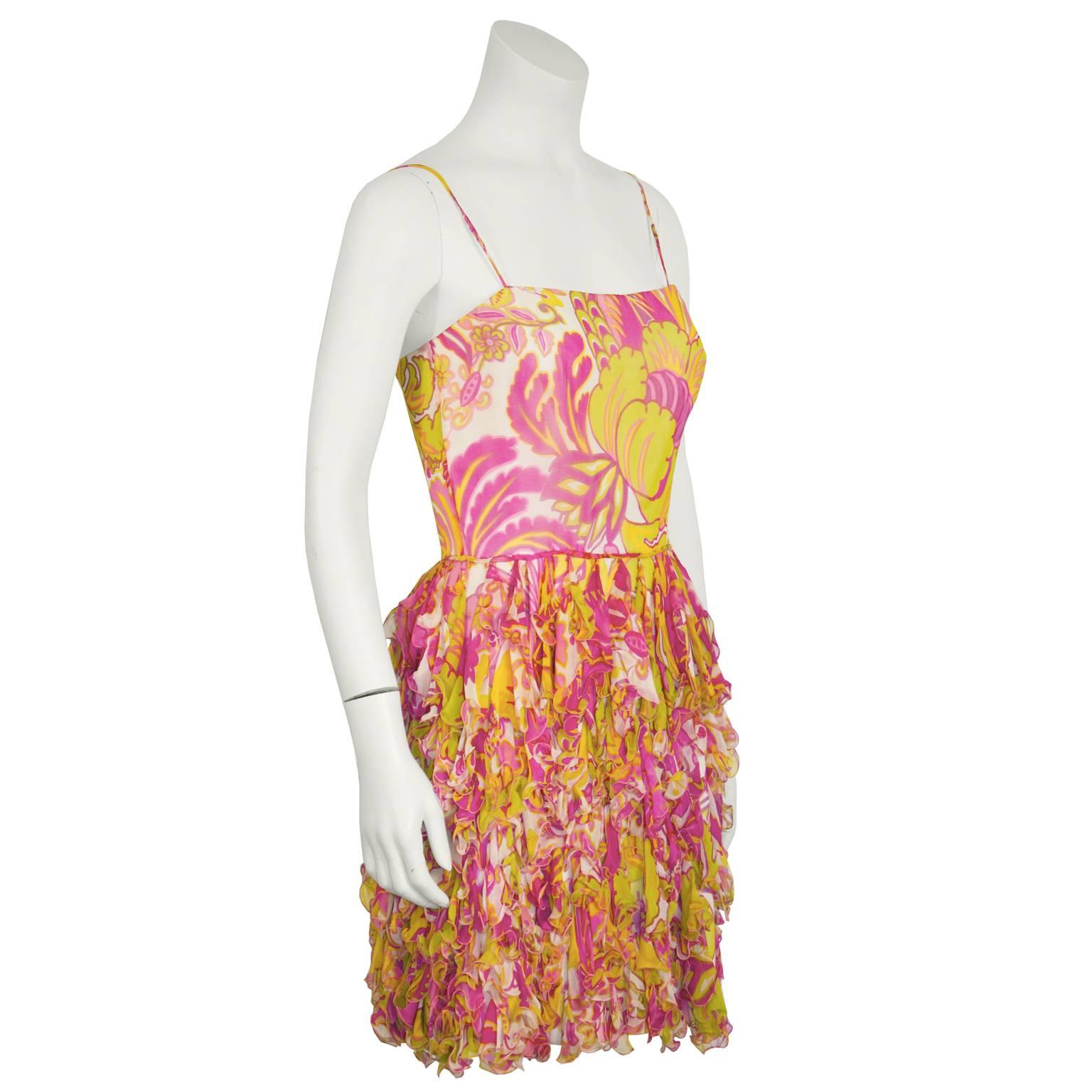 1970's Oscar de la Renta spaghetti strap floral chiffon cocktail dress. Vertical ruffles on skirt adds flirtatious touch. Back zip closure. Excellent condition. Fresh look for day or cocktail imagine how great this would be with a denim jacket? Fits