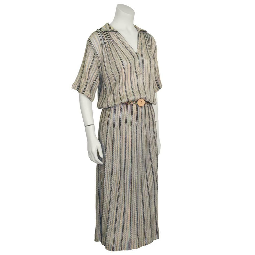 1970's Missoni knit daydress with matching rope belt. Lavender, pink, black and mint colored chevron knit dress with open collar and shirt like collar. The twisted rope belt fits at the natural waist and fastens with a wooden circular knob. The