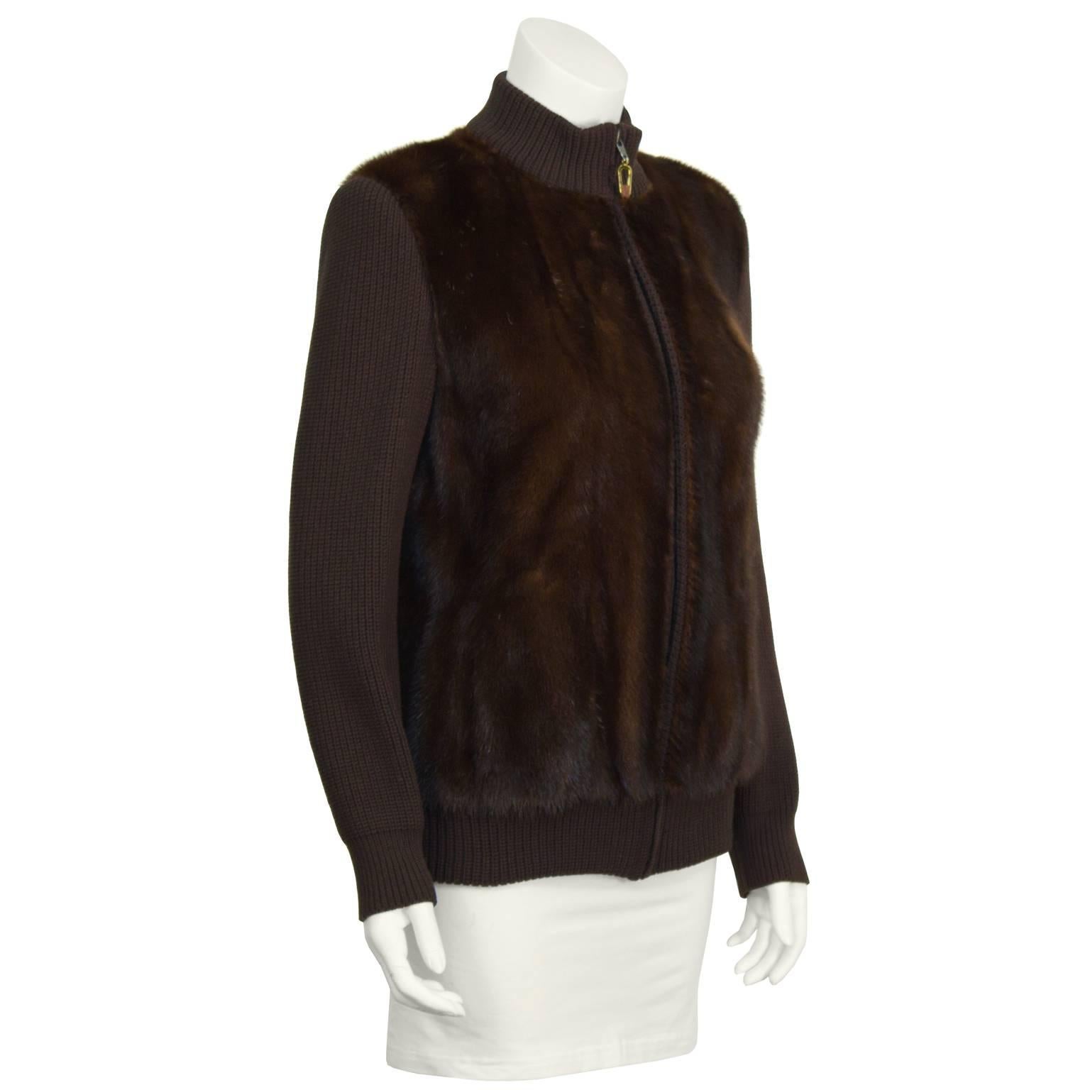 Anonymous made in France brown fur bomber jacket from the 1970's. Jacket features chocolate brown mink fur front panels, and a zipper up the front with a gold tab. The sleeves, collar, cuffs and hem are hand knit in matching brown wool. Interior is