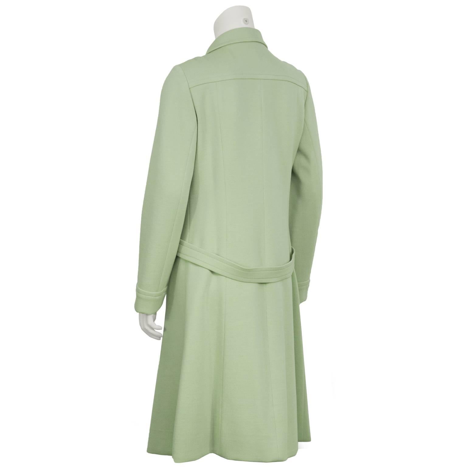 mint green coat