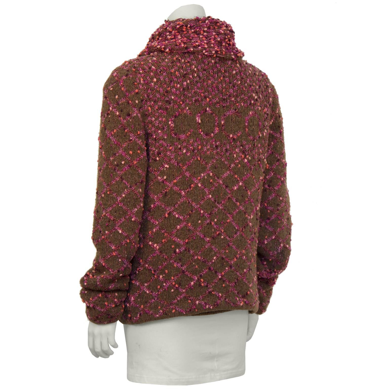 Chanel khaki and pink nubby boucle knit wool nylon blend sweater set from  Fall 2001. Features an allover intarsia quilted pattern with a camellia motif. The sleeveless shell has a textured cowl neckline and the cardigan style jacket does up with a