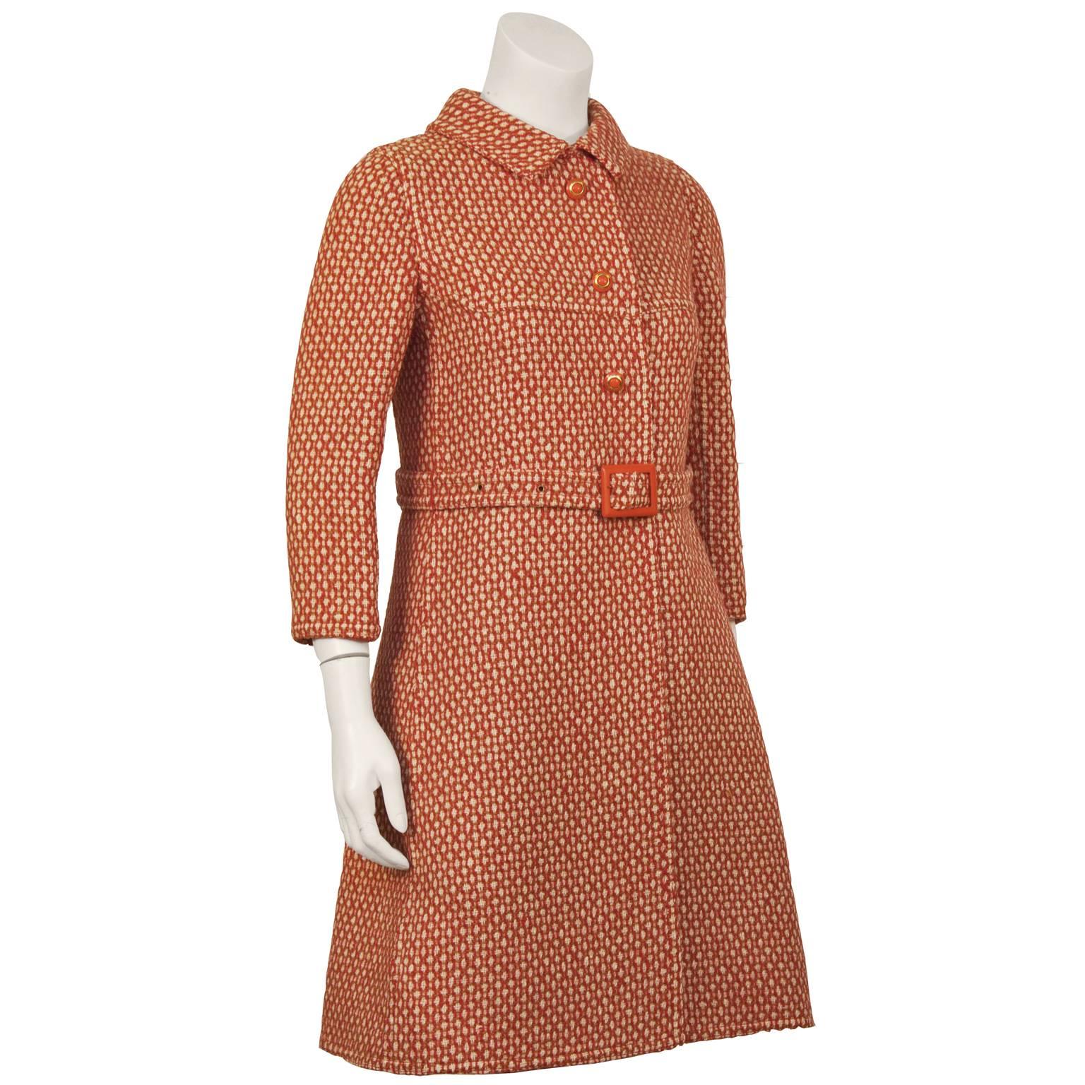 Storied Italian designer Antonelli 1960’s red and white and tan wool and mohair blend coat and skirt ensemble. The coat and skirt are both unlined made of two patterned wools fused together. The skirt is reversible and has two zippers on both back