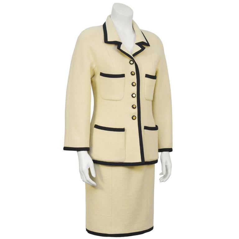 1980's Chanel Cream Suit with Black Ribbon Trim at 1stDibs