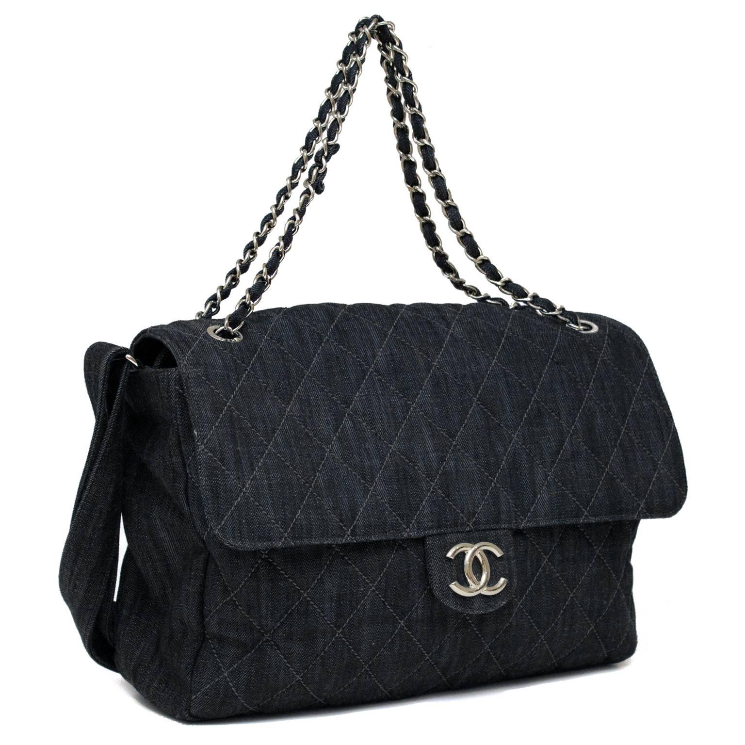 Chanel Jumbo 2.55 denim handbag from 2008. The bag is stitch quilted and features two straps; a classic silver tone chain that can be doubled and a wide denim shoulder strap that is adjustable and can be worn crossbody with reinforced navy leather