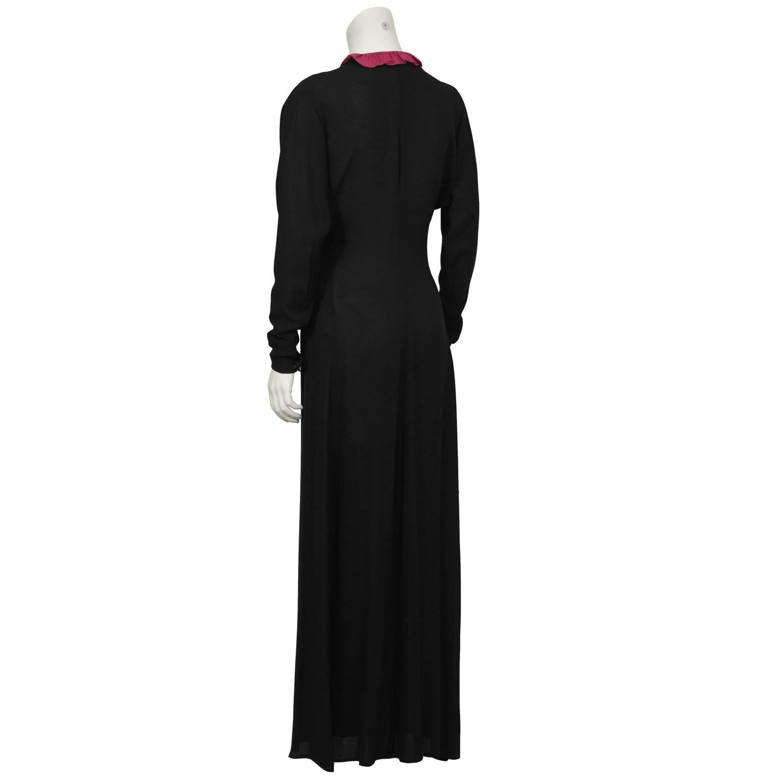 1970's Black Moss Crepe Gown with Fuchsia Ruffle Detail  In Excellent Condition In Toronto, Ontario
